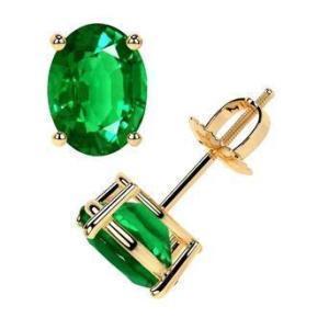 Usd 18404, 18k Gold Classic Four Prong Oval Cut Emerald Stud Earrings.